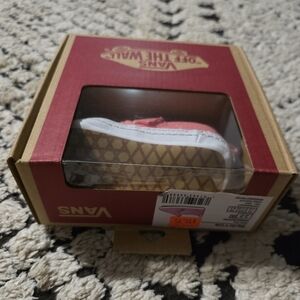 Vans off the wall pink and white infant shoes size 2.